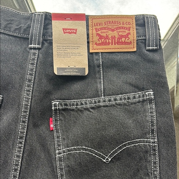 NWT Levi’s Mini High Waist Black jeans skirt Classic Black Denim size 27 - Picture 7 of 10